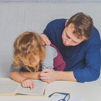 the dad and daughter do homework after primary school